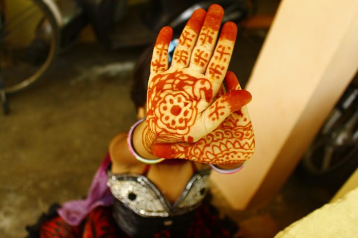 Latest news on child marriage| theprint.in Child's hands with mehendi