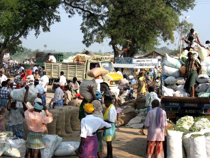 Latest news on inflation and election | theprint.in Farmers loading their produce