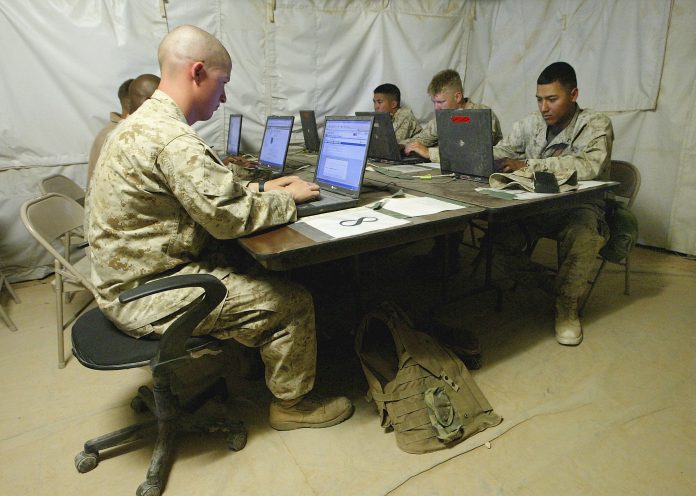 Latest news on cyber security | theprint.in U.S. marines using computers in a tent