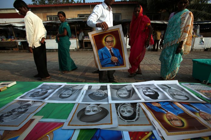 Latest news on Ambedkar | theprint.in Devotees of Ambedkar buy posters in Mumbai.