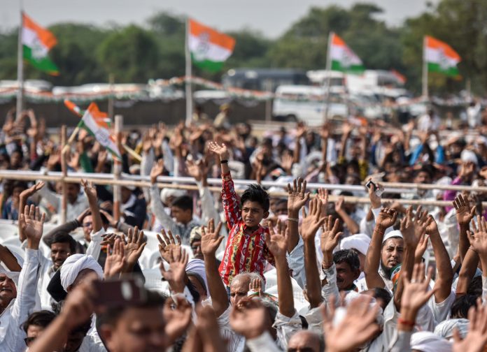 Latest news on Karnataka election | ThePrint.in Congress supporters and workers during an election campaign rally by Rahul Gandhi