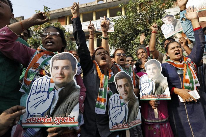 Latest news on politics | No matter Gujarat elections | ThePrint Congress party supporters holding pictures of Rahul Gandhi, in Ahmedabad.