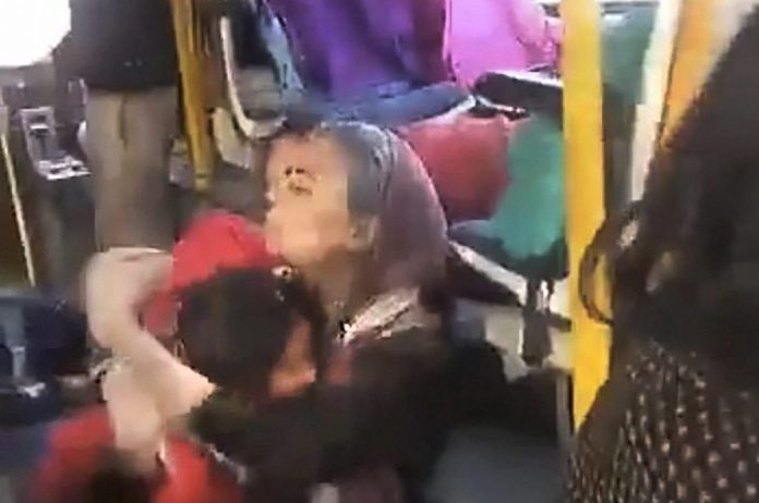 Latest news on Padmaavat | PM Modi must speak up | ThePrint A woman hugs a child crouched on the floor of the GD Goenka World School bus, as a mob protesting against the film Padmaavat threw stones at their bus in Gurugram on Wednesday.