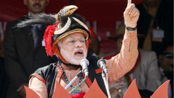 Latest news on BJP lead in Nagaland polls | theprint.in Narendra Modi in traditional Nagaland headgear | Twitter