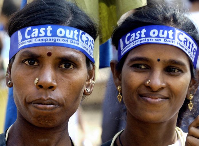 Latest news on SC/ST Atrocities Act | Report | theprint.in Two women at the World Social Forum, 2004, Mumbai | Getty Images