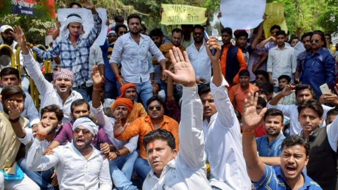 Latest news on SC/ST Act | ThePrint.in Activists of various groups during Bharat Bandh called over SC/ST reservation issue, in Allahabad