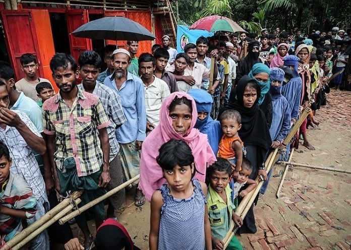 Latest news on refugees | Theprint.in Refugees standing in a queue at a refugee camp