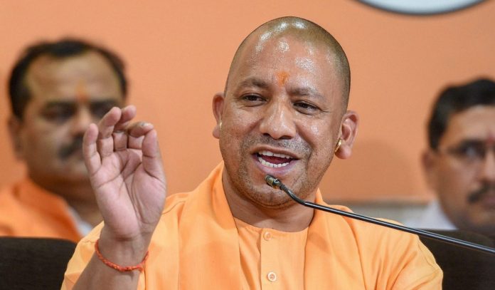 Yogi addresses press conference Uttar Pradesh Chief Minister Yogi Adityanath refuses to wear a cap offered to him at Kabir's mausoleum