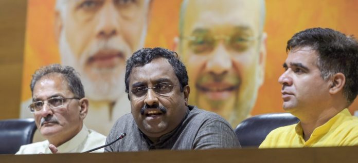 BJP pulls out of J&K govt BJP in-charge for Jammu and Kashmir Ram Madhav, flanked by the state Dy Chief Minister Kavinder Gupta and BJP state chief Ravinder Raina | PTI