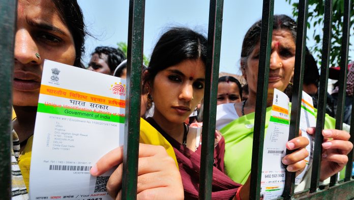 Latest news on Aadhaar | theprint.in Women line up at an Aadhar camp | Getty Images