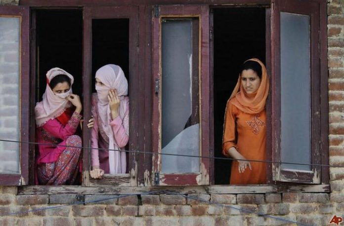 Latest news on militancy in India ~ThePrint.in Kashmiri women watch a rally from a window in Srinagar ~ Commons