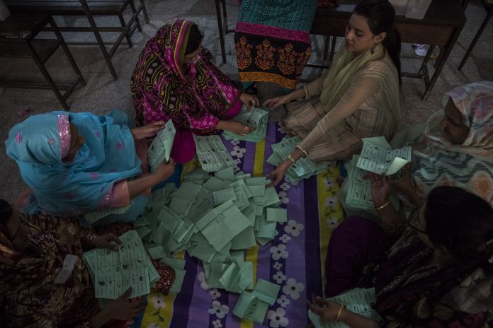 Latest news on Pakistan | theprint.in File photo of Pakistani election workers counting ballots in Lahore | Daniel Berehulak/Getty Images