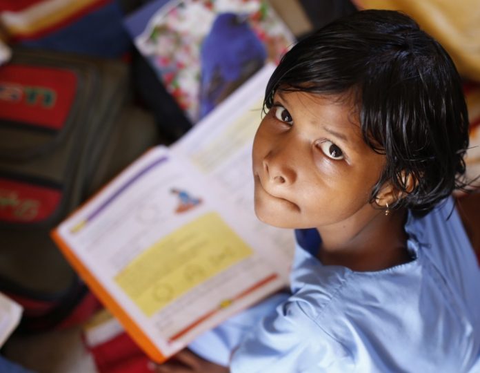 Latest news on adopted children | ThePrint.in A girl reading a book
