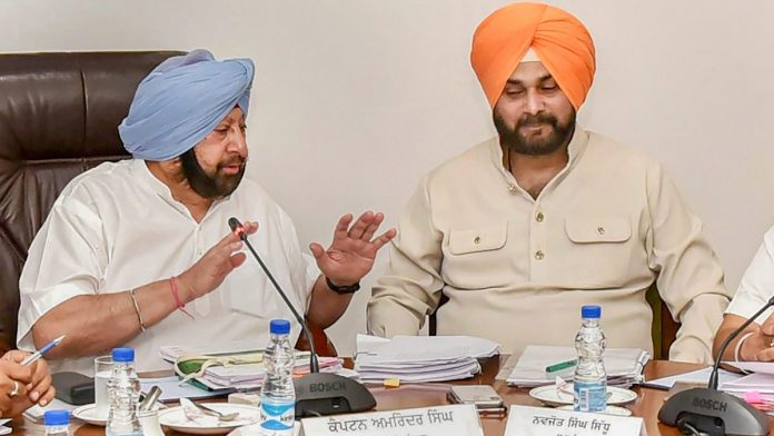 Latest news on Kartarpur | ThePrint Punjab Chief Minister Captain Amarinder Singh with Navjot Singh Sidhu during a Cabinet meeting in Chandigarh