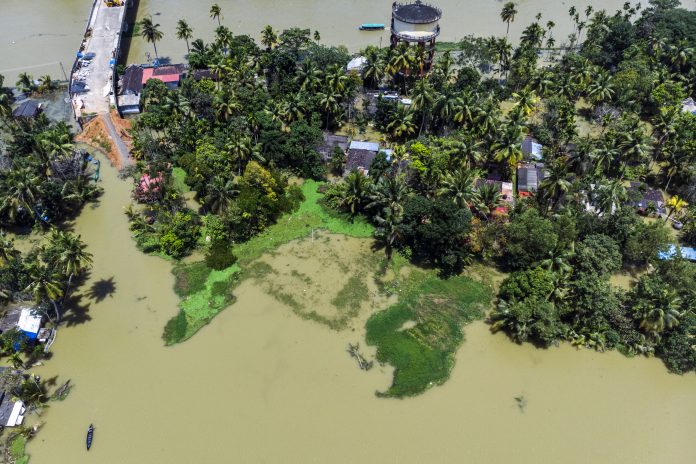 Latest news on Kerala floods | theprint.in Trees and houses are partially submerged in floodwaters, Alappuzha, Kerala | Prashanth Vishwanathan/Bloomberg