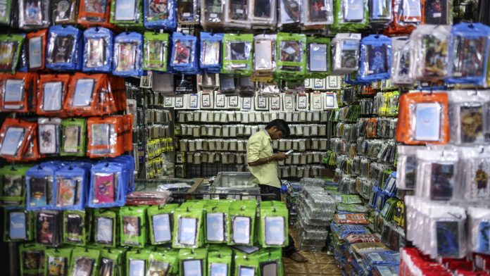 Latest news on smartphones | ThePrint.in A wholesale stall selling mobile phone accessories in Mumbai | Dhiraj Singh/Bloomberg