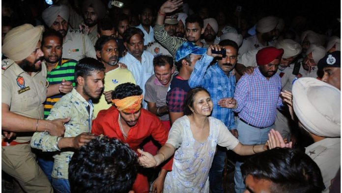 Latest news on train Accident in Amritsar | ThePrint Relatives mourn at the site of a train accident at Joda Phatak in Amritsar, Friday