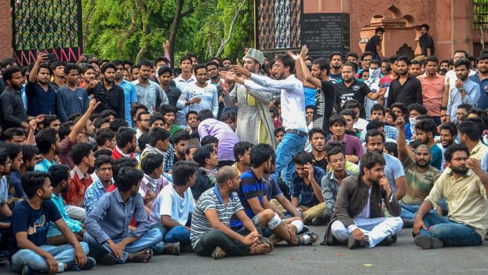 Latest news on Aligarh Muslim University | ThePrint.in File image of students protesting in front of the gate of AMU | PTI