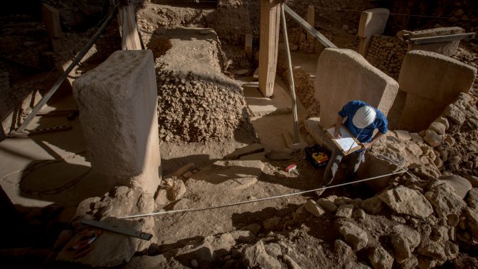 Latest news on archaeology | ThePrint An archaeologist at work in Sanliurfa, Turkey | Getty images