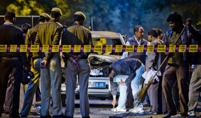 Latest news on terrorism and voter turnout | theprint.in Police and forensic officers examine a damaged Israeli embassy vehicle after an explosion in New Delhi, 2012 | Daniel Berehulak /Getty Images