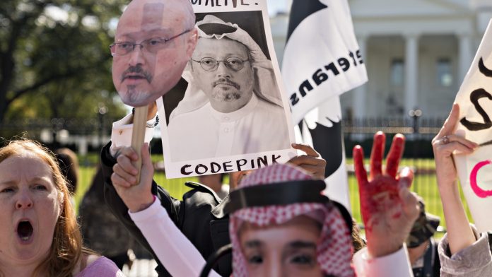 Latest news on Jamal Khashoggi Protesters hold photographs of journalist Jamal Khashoggi outside the White House in Washington, D.C.| Andrew Harrer/Bloomberg