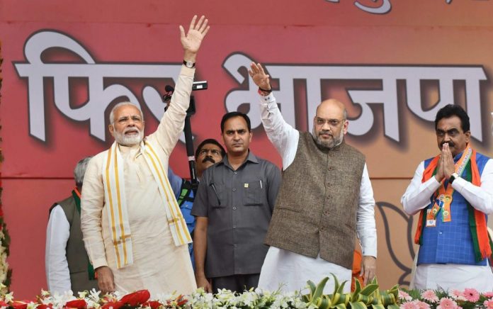 PM Modi with BJP president Amit Shah (R) and Madhya Pradesh CM Shivraj Singh Chouhan | PTI