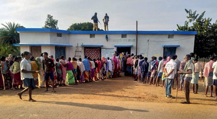 Latest News on opinion polls | ThePrint.in Voters in Chhattisgarh stand in line to cast their ballots | PTI