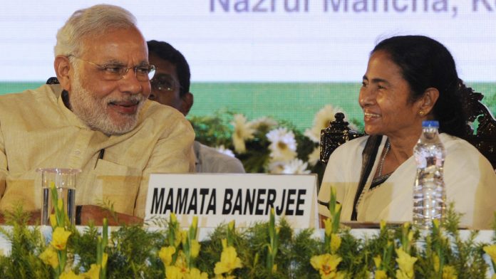 Prime Minister Narendra Modi Visits Kolkata Prime Minister Narendra Modi and West Bengal CM Mamata Banerjee | Ashok Nath Dey/Hindustan Times via Getty Images