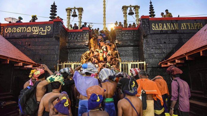 Latest news on Sabarimala and Supreme Court Devotees enter the Sabarimala temple as it opens amid tight security, November 2018 | PTI