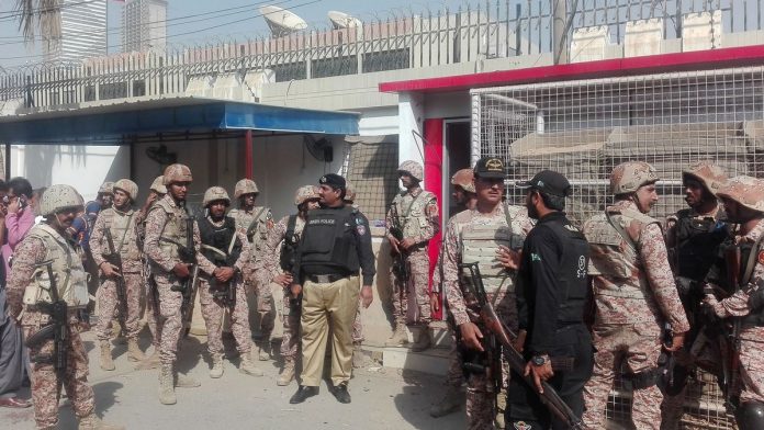 Latest news on Karachi attack | ThePrint Pakistani security personnel stand outside the Chinese consulate after the attack | Asif Hassan/AFP/Getty Images