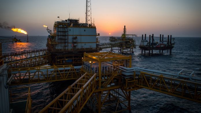 Latest news on Iran oil | ThePrint Gas flares burn from pipes aboard an offshore oil platform near Lavan island, Iran | Ali Mohammadi/Bloomberg
