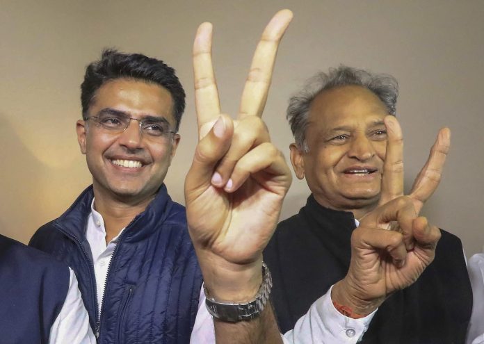 Latest news on Assembly Election Results | ThePrint.in Congress leaders Ashok Gehlot (R) and Sachin Pilot (C) flash victory signs after the declaration of Rajasthan Assembly election result | PTI