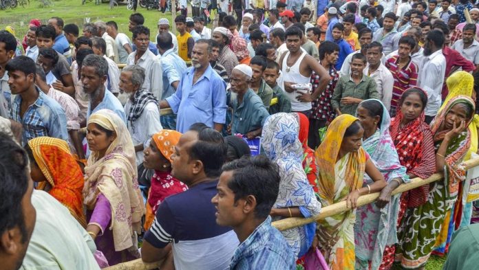 Latest news on NRC | theprint.in People wait to check their names on the final draft of the Assam's National Register of Citizens