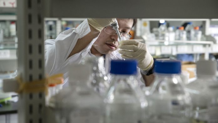 Latest news on science | ThePrint.in A researcher prepares a sample inside a laboratory in China |