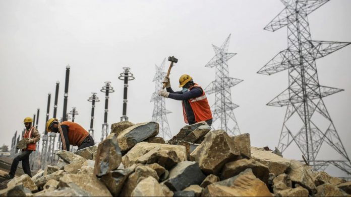 Latest news on state PSUs | Opinion | theprint.in Workers in Jammu & Kashmir | Representational image | Dhiraj Singh/Bloomberg