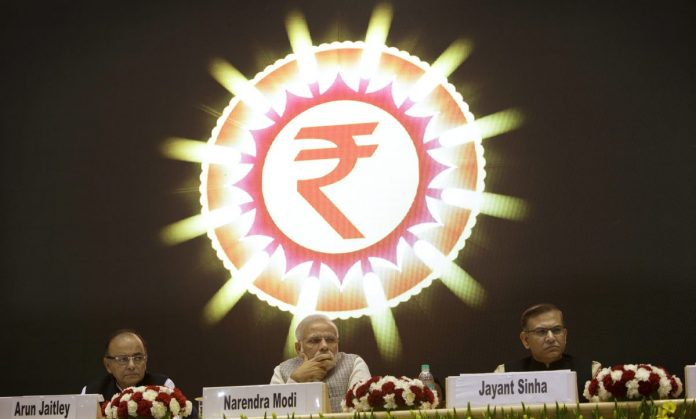 Latest news on MUDRA scheme | theprint.in Arun Jaitley, Narendra Modi, and Jayant Sinha at the launch of the Micro Units Development and Refinance Agency (MUDRA) Bank | Kuni Takahashi/Bloomberg