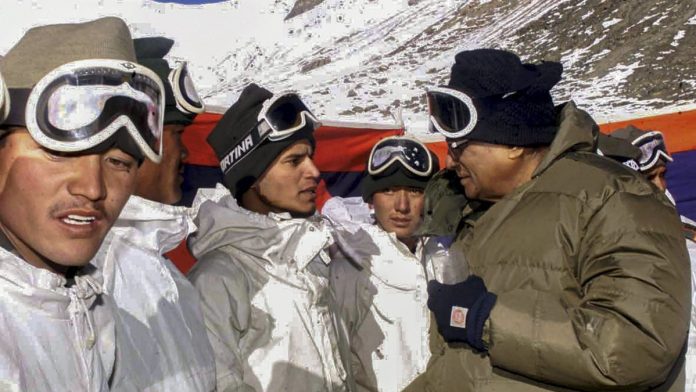 George Fernandes dies In this Nov 18, 2001 file photo, then defence minister George Fernandes interacts with the jawans at Siachen | PTI