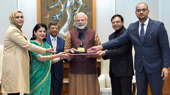 Latest news on Narendra Modi | ThePrint Prime Minister Narendra Modi with the Philip Kotler Presidential award in New Delhi | PTI