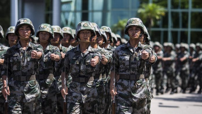 Latest news on chinese army | ThePrint Members of the People's Liberation Army (PLA) march during a demonstration at an open day (Representational image)