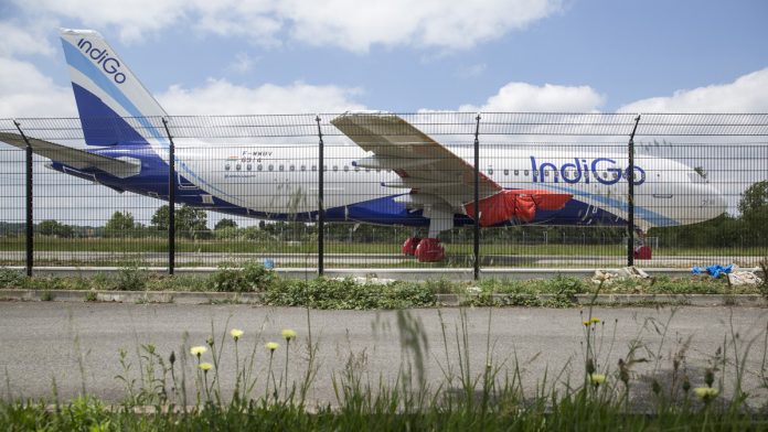 Latest news on Airbus A320neo | ThePrint A protective cover sits on a wing engine fitting of an undelivered Airbus A320neo passenger jet operated by IndiGo | Balint Porneczi/Bloomberg