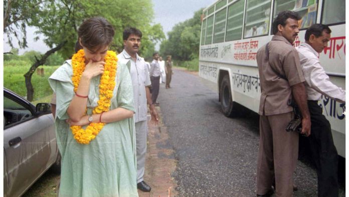 Priyanka Gandhi waits by the road during a campaign Priyanka on the campaign trail in Amethi for her mother Sonia Gandhi | Praveen Jain/ThePrint