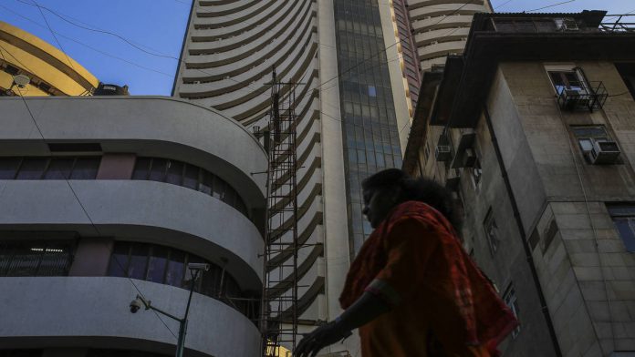 Latest news on Economy | ThePrint A pedestrian walks past the Bombay Stock Exchange (BSE) building in Mumbai
