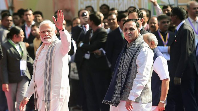 Latest news on Vibrant Gujarat Prime Minister Narendra Modi and Gujarat CM Vijay Rupani arrive to inaugurate 'Vibrant Gujarat Global Trade Show' in Ahmedabad