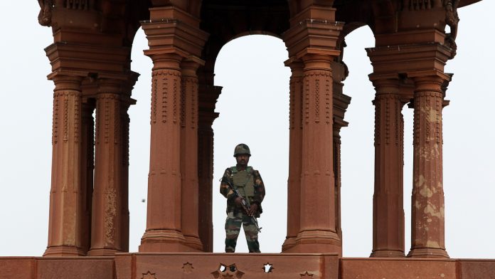 Reactions In New Delhi As India-Pakistan Tensions Escalate Following Air Strike Security personnel stand guard over Raisina Hill in New Delhi| T. Narayan/Bloomberg