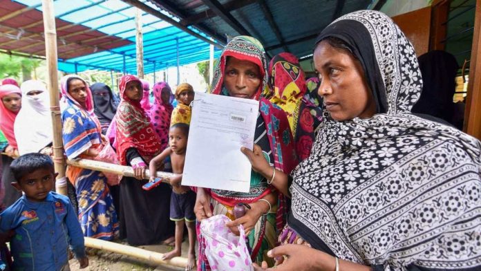 Latest news on Assam NRC | ThePrint People queue up to check their names on the final draft of the NRC in Assam