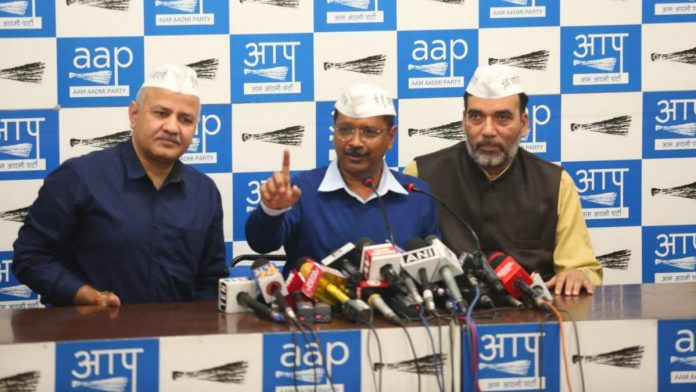 Latest news on AAP Delhi CM and AAP chief Arvind Kejriwal (C) with deputy CM Manish Sisodia and Gopal Rai at the press conference | PTI