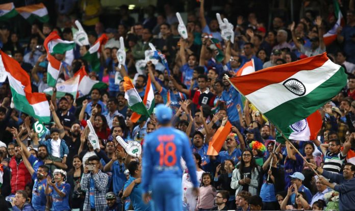Captain Virat Kohli looks towards a sea of supporters