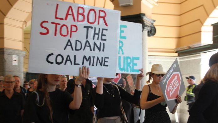 Latest news on coal mine | ThePrint People protesters against Carmichael coal mine which is developed by Adani