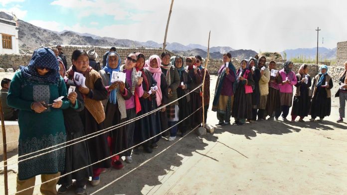 Lok Sabha polls: Fifth phase Voters stand in a queue at a polling station during the fifth phase of Lok Sabha polls, at Shey village in Leh, Monday, May 6, 2019