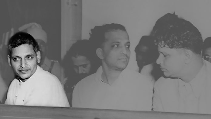 Nathuram Godse Trial of people accused of participation and complicity in Mahatma Gandhi's assassination in the Special Court in Delhi on May 27, 1948. Godse highlighted | Commons